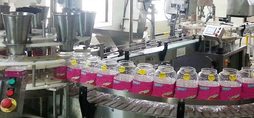 Automated jar and bottle feeding system